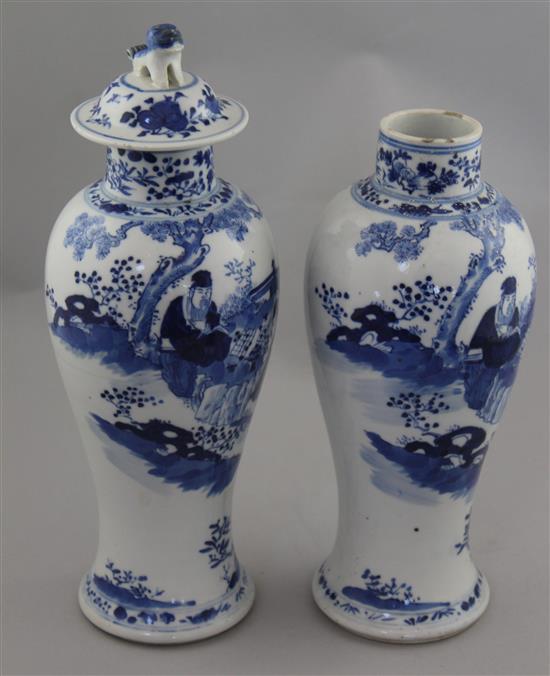 Two Chinese blue and white baluster vases and a cover, late 19th century, 28cm